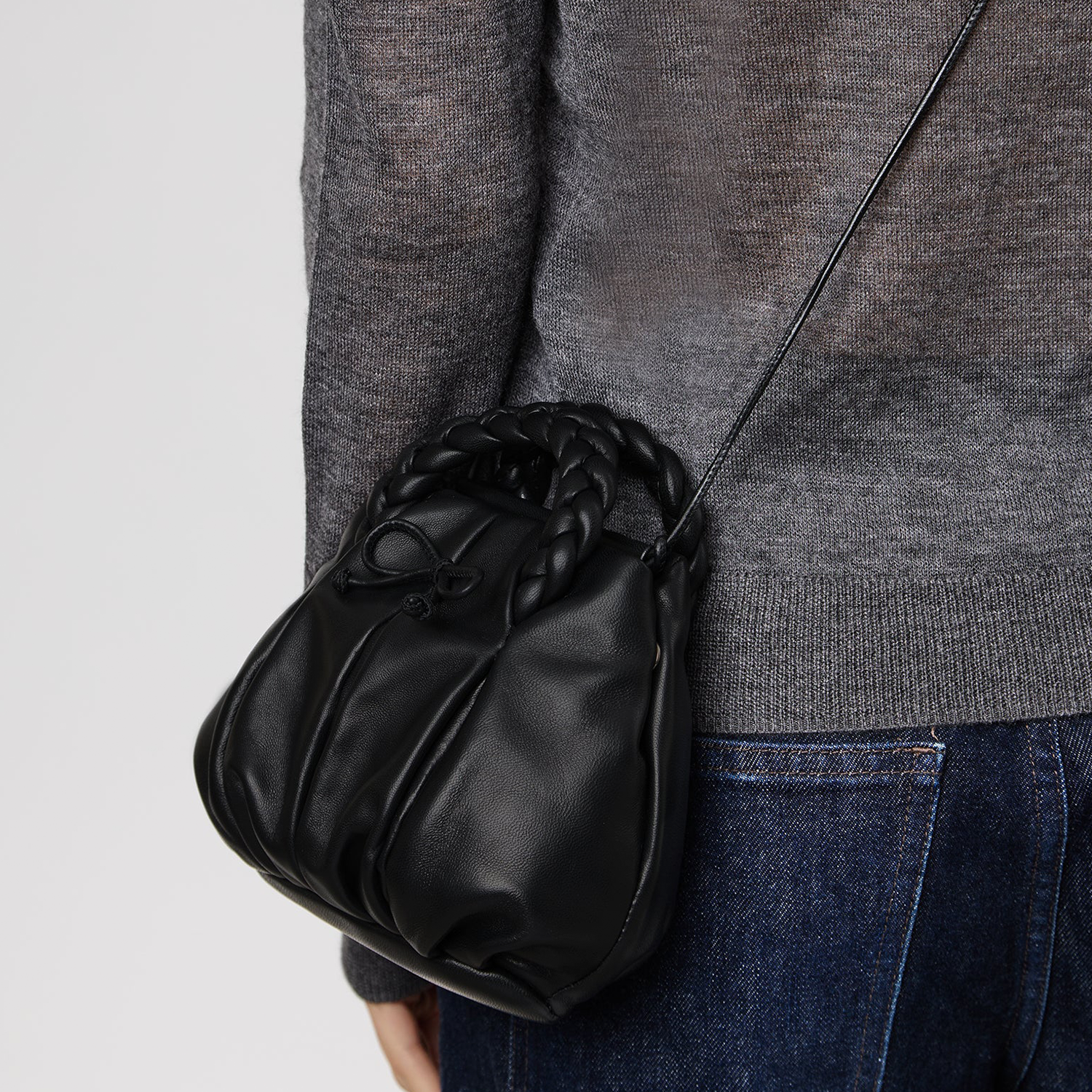 Sleek Jet Black Soft Gathered Petite Rounded Pouch With Thick Woven Braided Loop Grip And Tiny Knotted Closure Tie